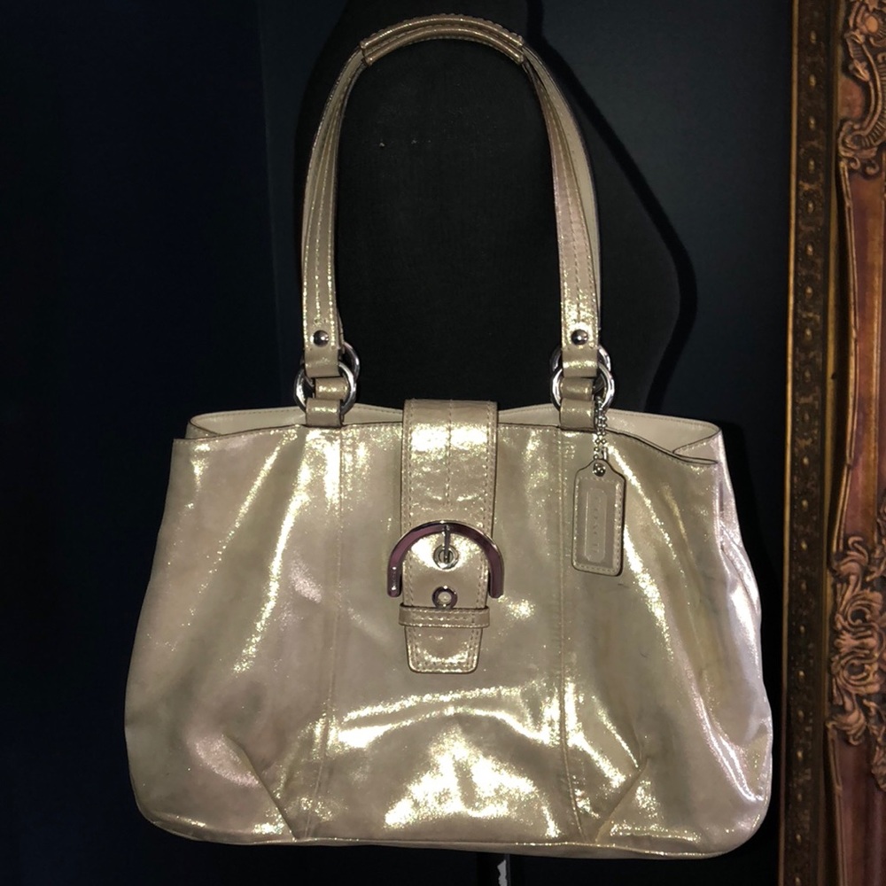 Metallic gold COACH purse